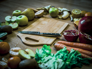 cut fruits on the wooden table top view