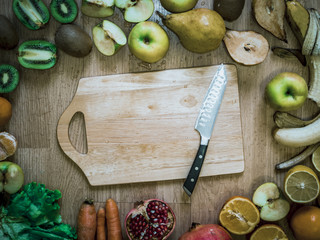 cut fruits on the wooden table top view