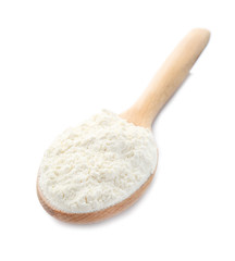 Fototapeta na wymiar Wooden spoon with wheat flour on white background