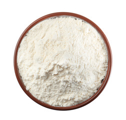 Bowl with wheat flour on white background, top view
