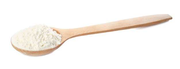 Fototapeta na wymiar Wooden spoon with wheat flour on white background