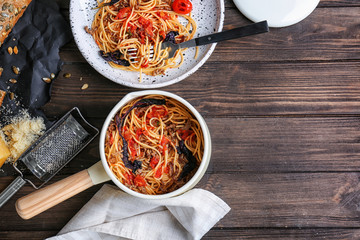 Delicious pasta Bolognaise in pan on table