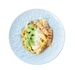 Delicious pasta with chicken on plate against white background