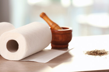 Roll of paper towels on kitchen table