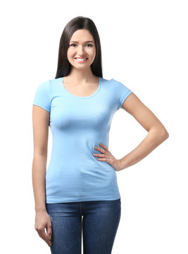 Young woman in stylish t-shirt on white background. Mockup for design