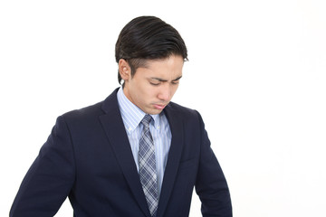 疲れた様子のビジネスマン