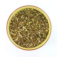 Dried lemon balm pile isolated on white.