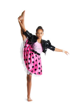 Image of flexible little girl doing vertical split Beautiful little girl dancing