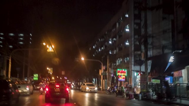 Seamless loop time lapse of car driving on highway at night. Video. timelapse of car driving on highway at night through tunnels. VIdeo. Driving through the streets
