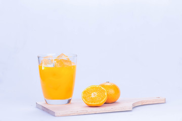 Orange Juice with White Wood Cutting Board