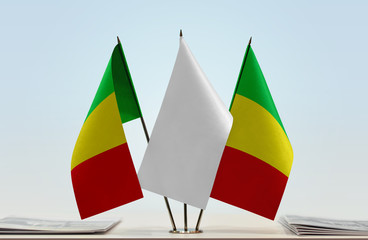 Two flags of Mali with a white flag in the middle