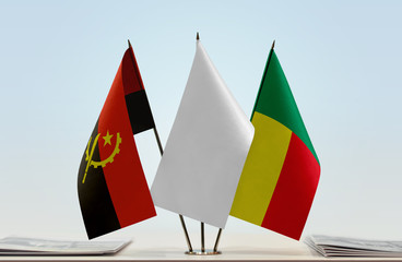 Flags of Angola and Benin with a white flag in the middle