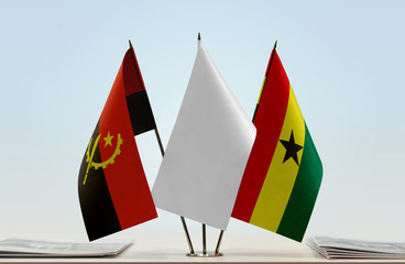 Flags of Angola and Ghana with a white flag in the middle