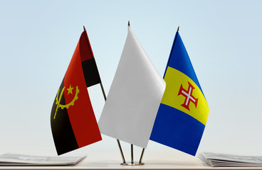 Flags of Angola and Madeira with a white flag in the middle