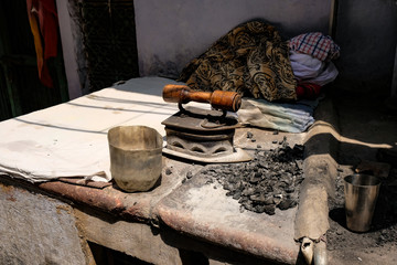 coal iron on street in Old Delhi
