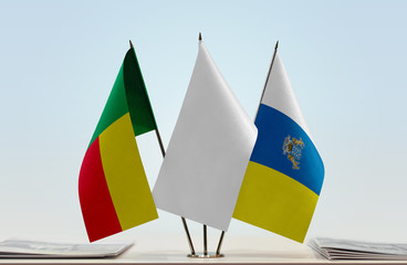 Flags of Benin and Canary Islands with a white flag in the middle