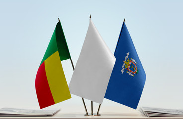 Flags of Benin and Melilla with a white flag in the middle