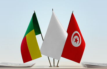 Flags of Benin and Tunisia with a white flag in the middle
