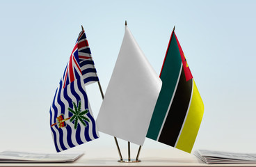 Flags of British Indian Ocean Territory and Mozambique with a white flag in the middle