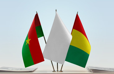 Flags of Burkina Faso and Guinea with a white flag in the middle