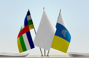 Flags of Central African Republic and Canary Islands with a white flag in the middle