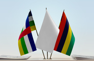 Flags of Central African Republic and Mauritius with a white flag in the middle