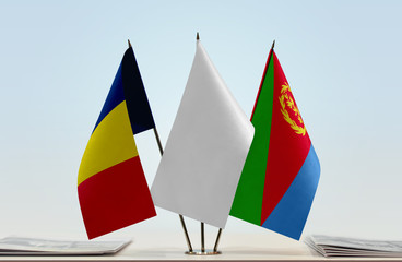Flags of Chad and Eritrea with a white flag in the middle