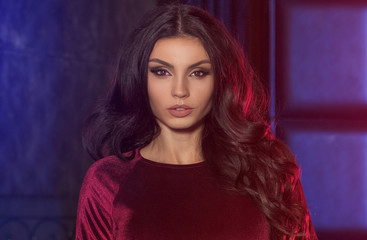 Elegant lady with glamour makeup posing.