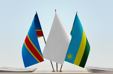 Flags of Democratic Republic of the Congo (DRC, DROC, Congo-Kinshasa) and Rwanda with a white flag in the middle