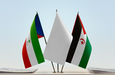 Flags of Equatorial Guinea and Sahrawi Arab Democratic Republic with a white flag in the middle