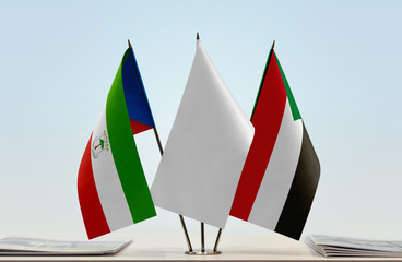 Flags of Equatorial Guinea and Sudan with a white flag in the middle