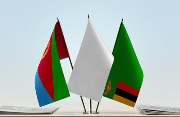 Flags of Eritrea and Zambia with a white flag in the middle