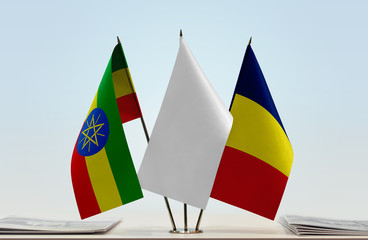 Flags of Ethiopia and Chad with a white flag in the middle