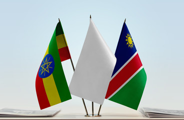 Flags of Ethiopia and Namibia with a white flag in the middle