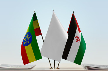 Flags of Ethiopia and Sahrawi Arab Democratic Republic with a white flag in the middle