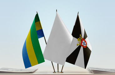 Flags of Gabon and Ceuta with a white flag in the middle