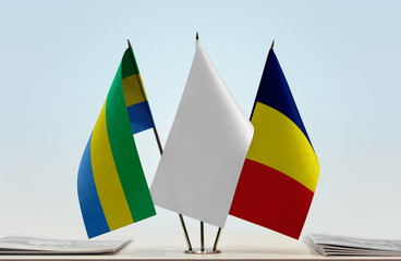 Flags of Gabon and Chad with a white flag in the middle