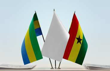 Flags of Gabon and Ghana with a white flag in the middle