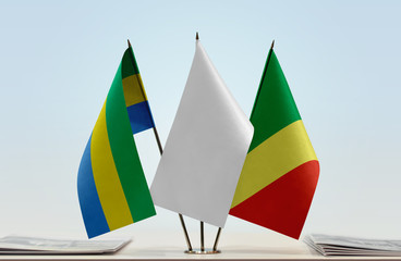 Flags of Gabon and Republic of the Congo with a white flag in the middle