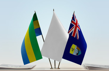 Flags of Gabon and Saint Helena with a white flag in the middle