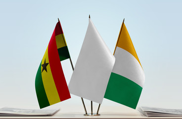 Flags of Ghana and Ivory Coast with a white flag in the middle