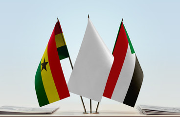 Flags of Ghana and Sudan with a white flag in the middle