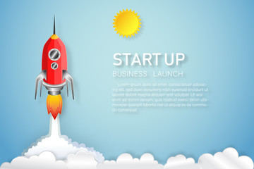 Red Rocket launch on the clouds and blue sky as paper art, craft style and business Startup project concept. flat design vector illustration.