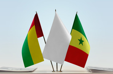 Flags of Guinea-Bissau and Senegal with a white flag in the middle