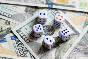 Money with dice. Concept of success and winning.