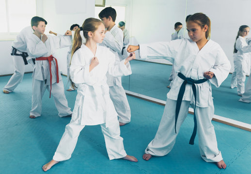 Children training in pairs