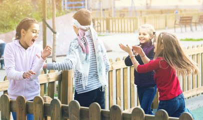 kids playing at Dead man in street