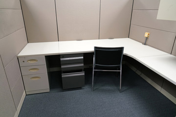 cubicle and office furniture in office room
