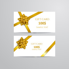 Gift Cards With gold Bow And Ribbon.