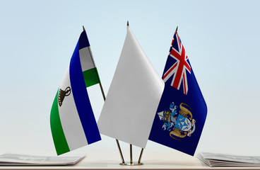 Flags of Lesotho and Tristan da Cunha with a white flag in the middle